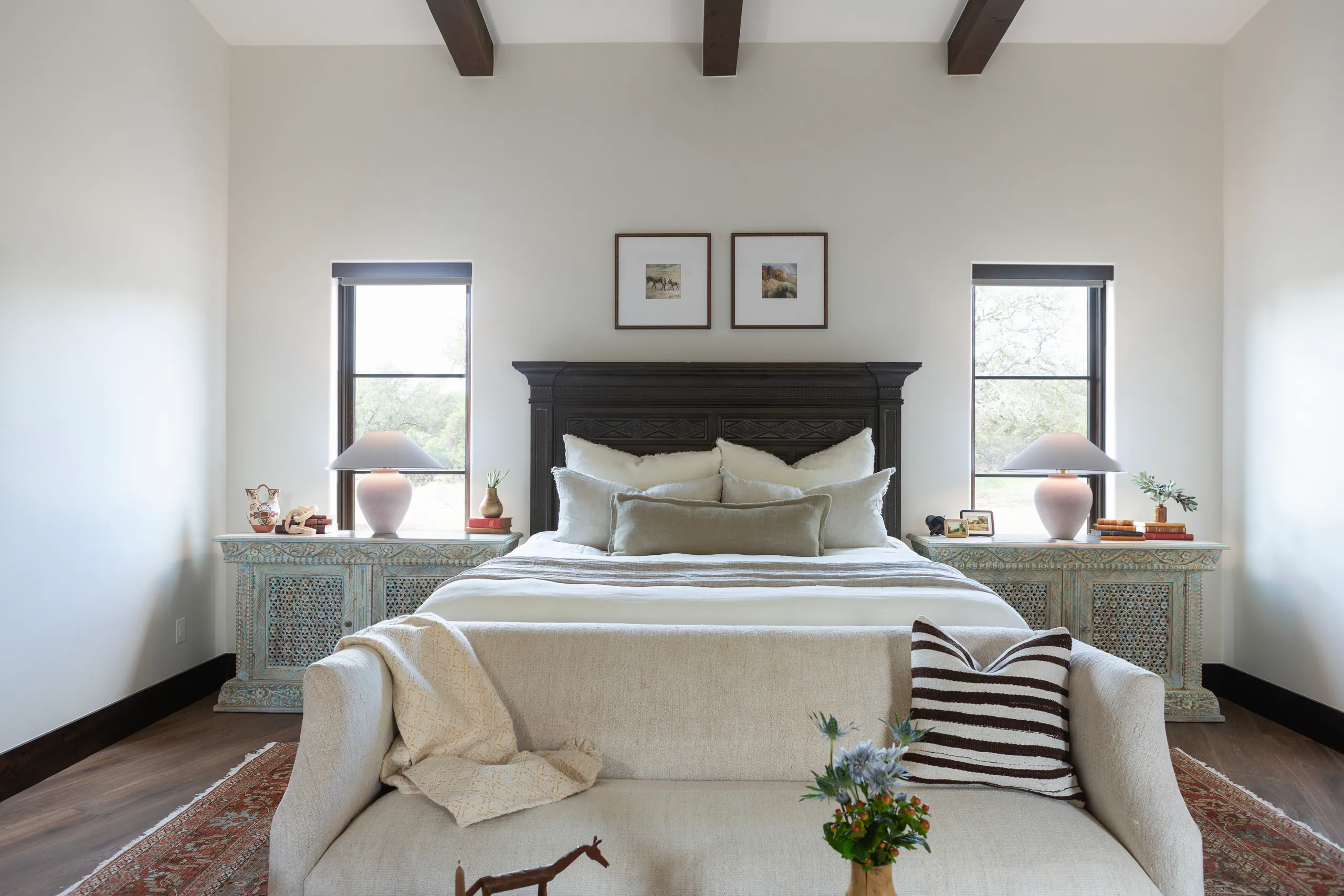 Primary bedroom suite filled with natural light
