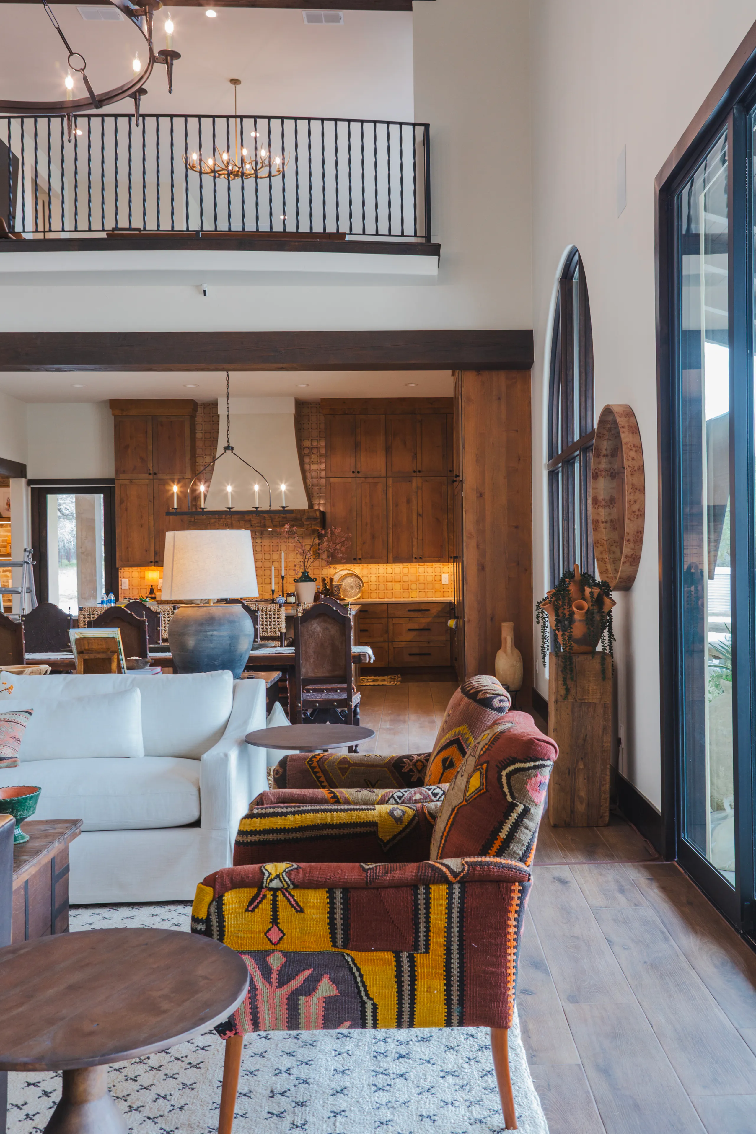 Formal dining room with layered lighting and oak floors