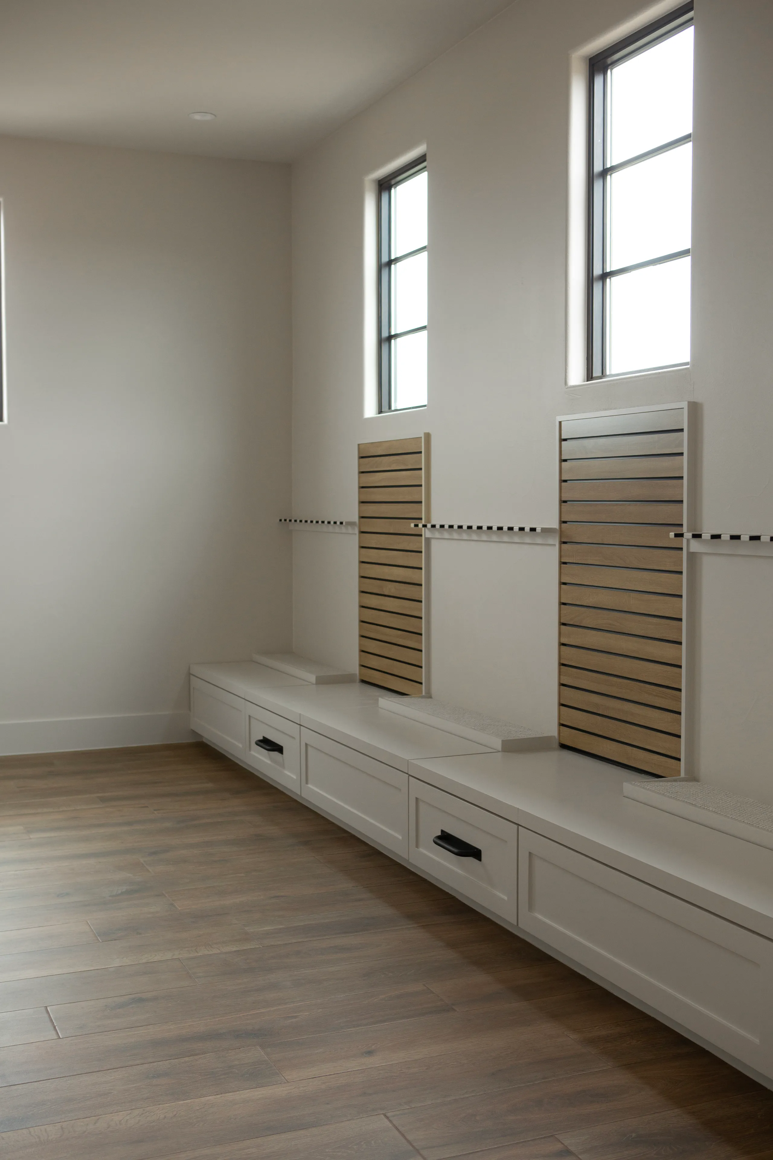 Primary bath with freestanding tub and arched window