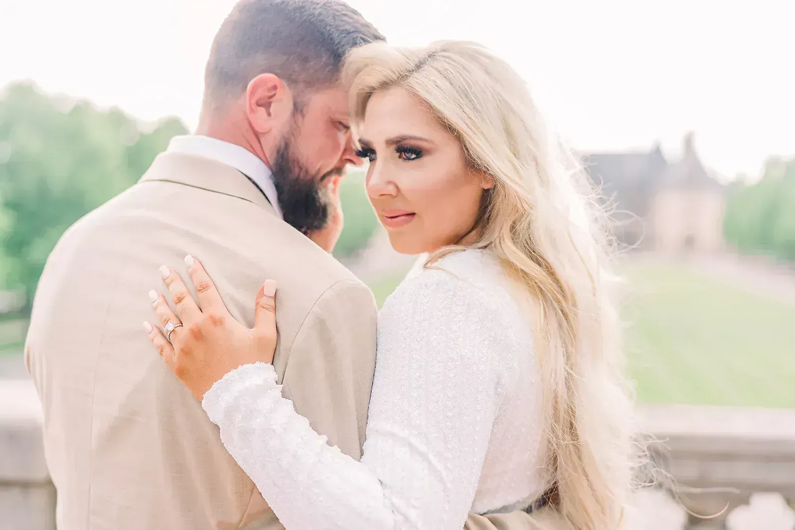Candid laughter between couple in a Texas Hill Country garden setting
