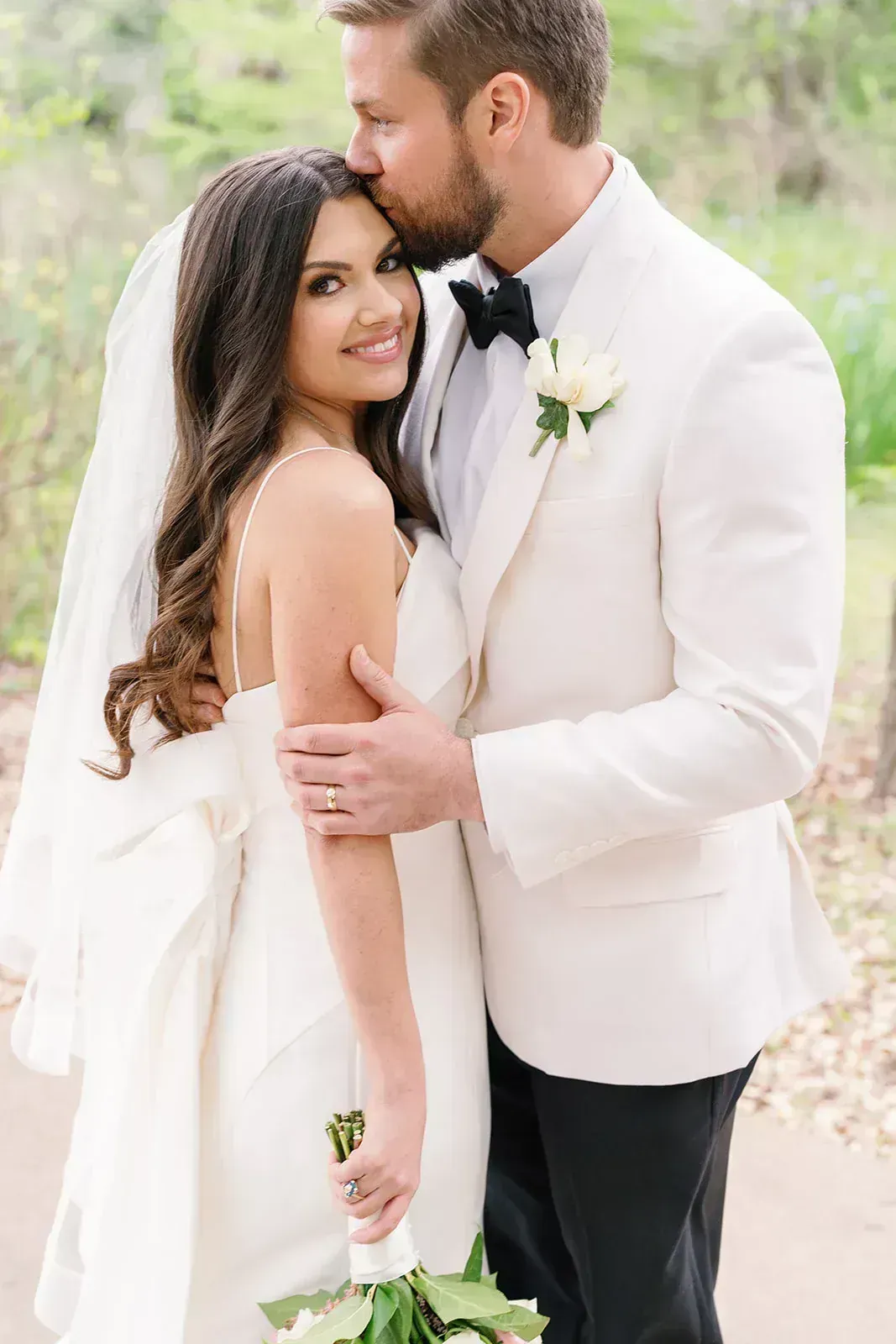 Couple portrait with Marble Falls limestone backdrop