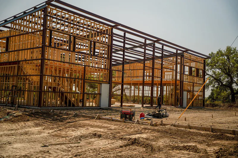 Two-story barndominium with steel and wood framing